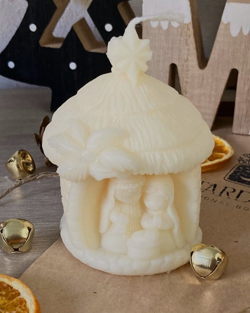 candela Feliz navidad. Una candela profumata a forma di presepe in cera di soia.